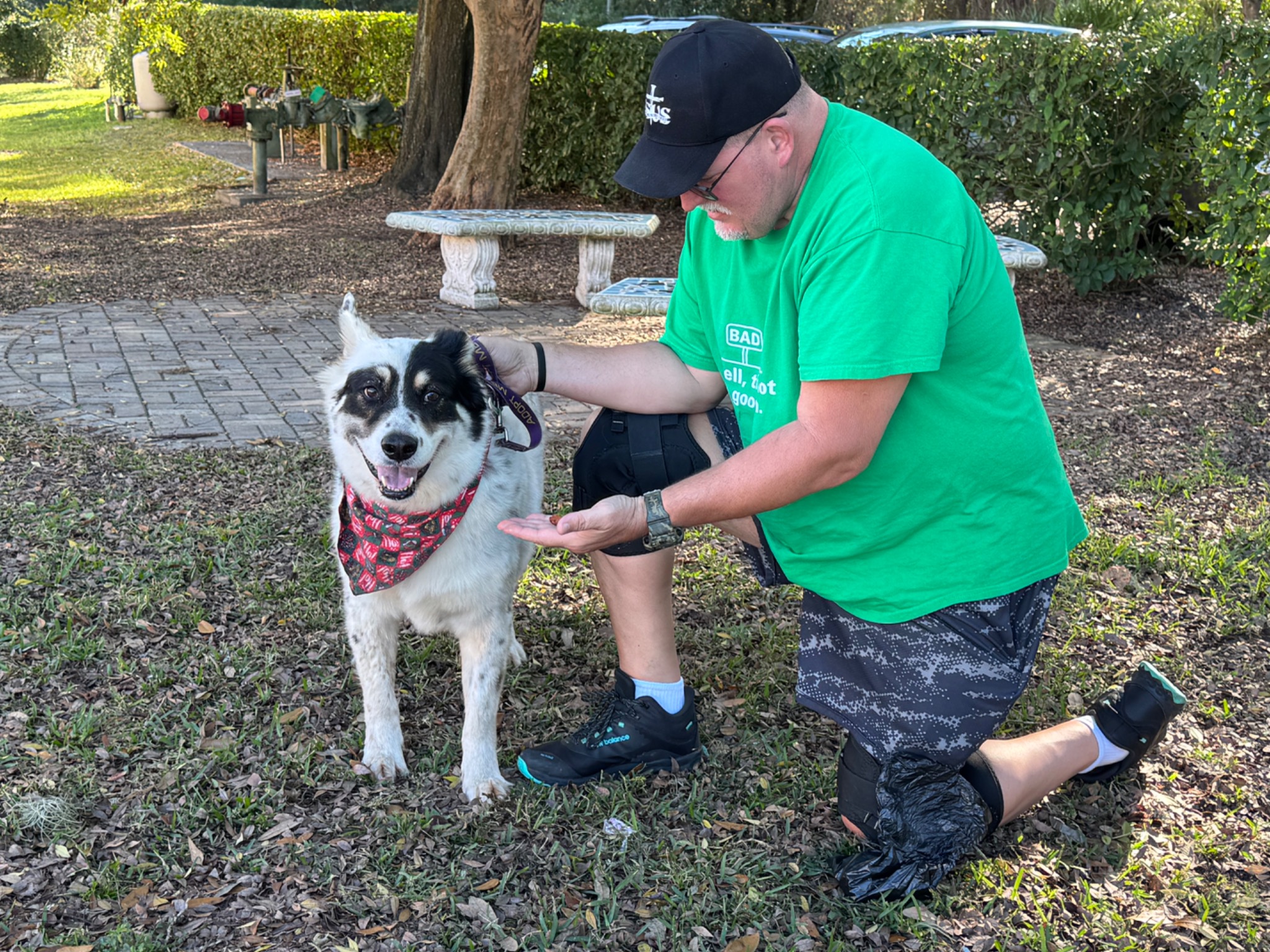 Old Glory member working with his service dog during outdoor training"